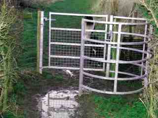 The picture is of the kissing gate referred to by Russen. It might look better painted black.